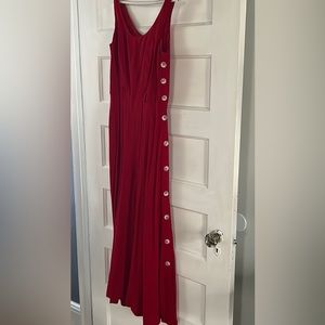 Red dress with white buttons on the left
